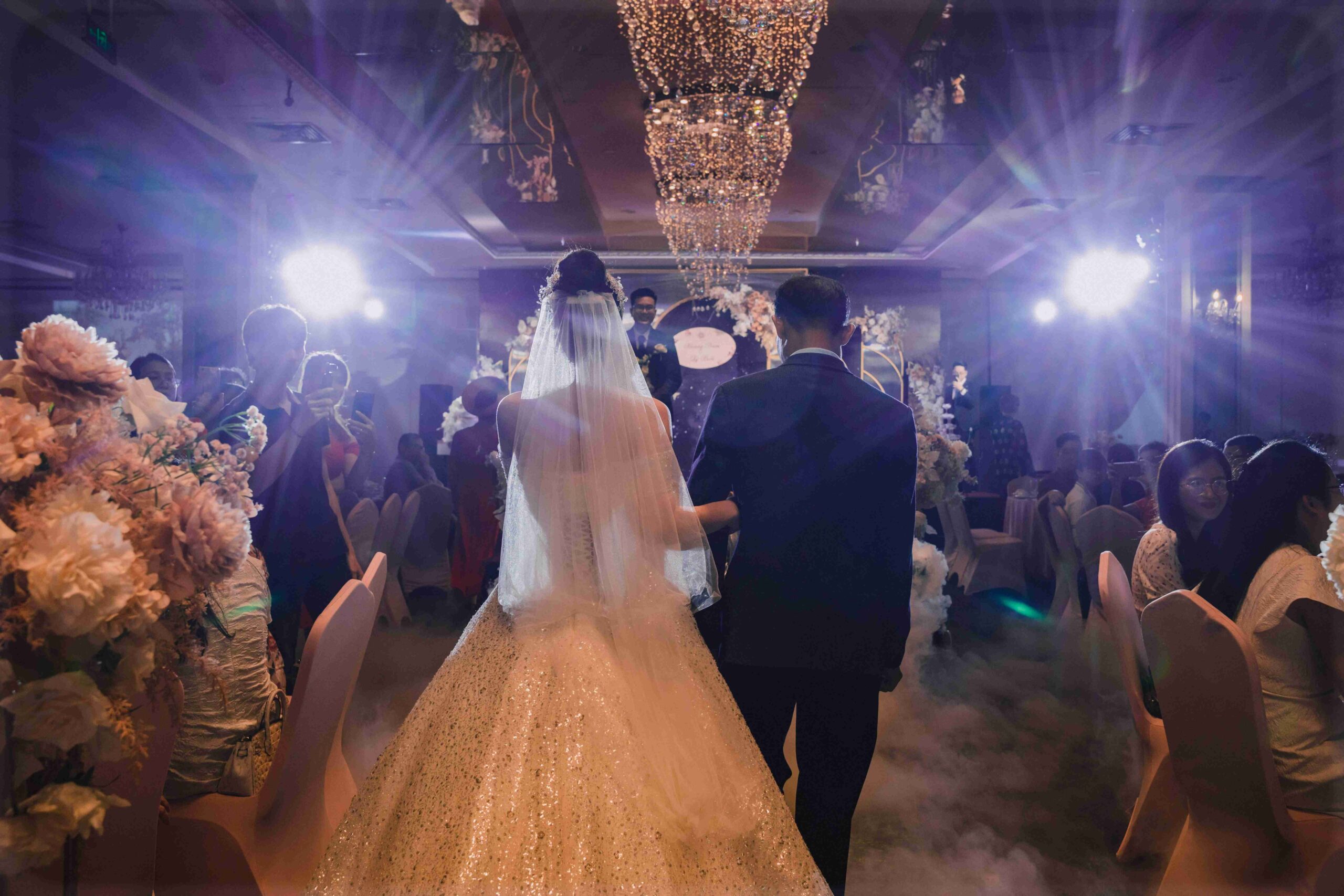 luxury wedding reception ballroom guests chandelier